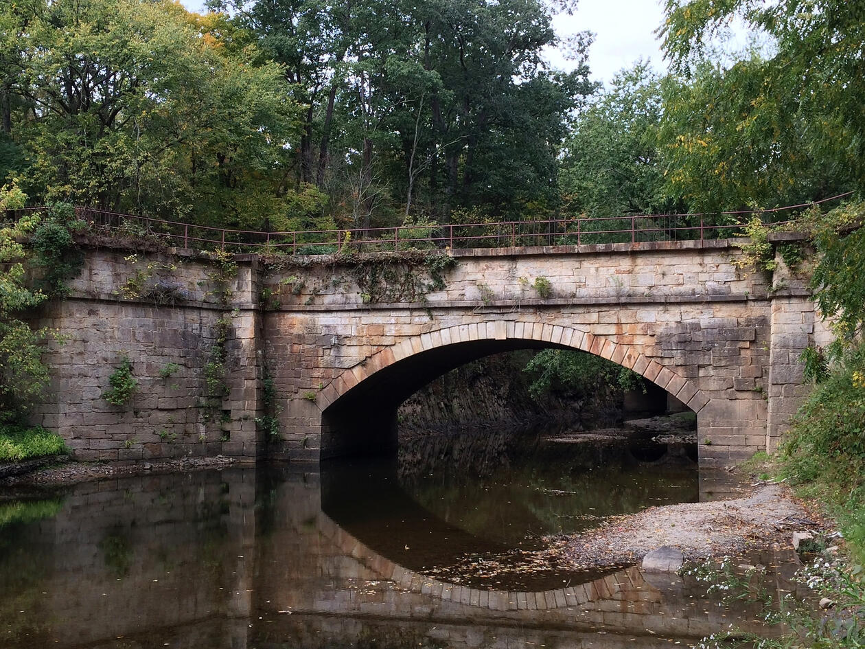Bridge with a creek going underneath along the C&O Canal